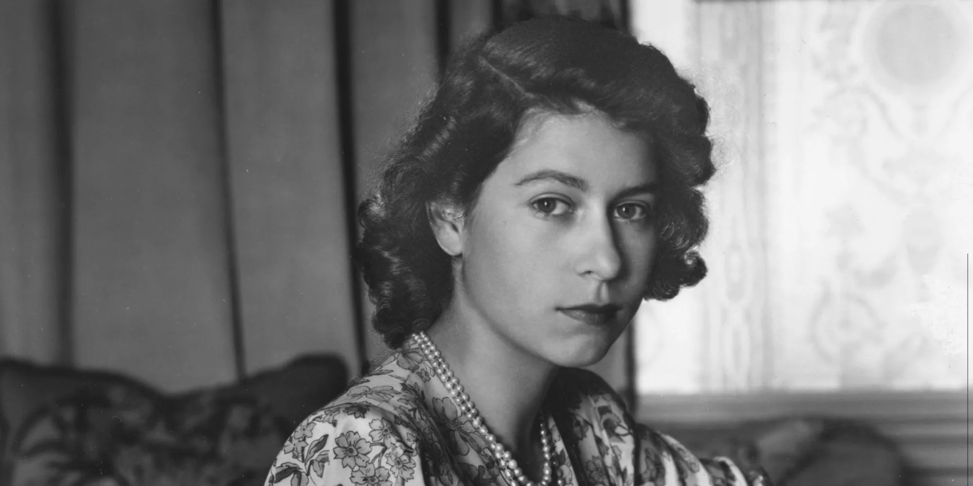 30th May 1944: Queen Elizabeth II (as Princess Elizabeth) writing at her desk in Windsor Castle, Berkshire. (Photo by Lisa Sheridan/Studio Lisa/Getty Images)