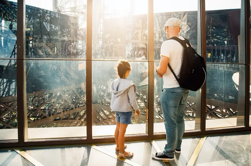A family inside of Eiffel Tower