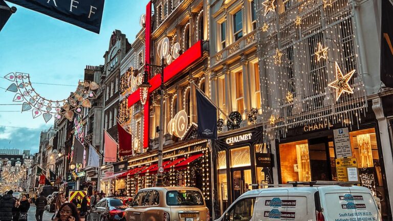 Bond Street in London, UK, decorated with elaborate Christmas lights and displays